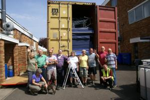 The volunteers who loaded a very full container